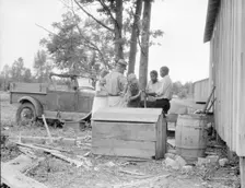 White and blacks solve problems together, Sherwood Eddy cotton cooperative...Mississippi, 1936. Creator: Dorothea Lange