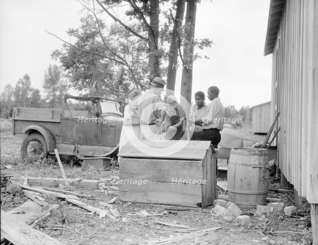 White and blacks solve problems together, Sherwood Eddy cotton cooperative...Mississippi, 1936. Creator: Dorothea Lange.