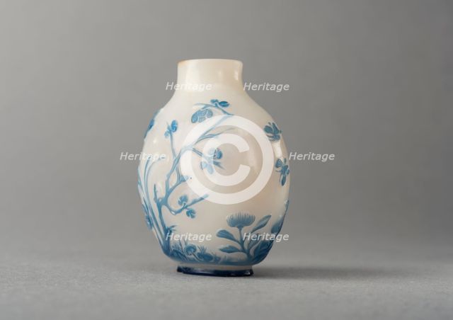 White glass snuff bottle with blue overlay, China, Qing dynasty, 1644-1911. Creator: Unknown.