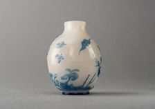White glass snuff bottle with blue overlay, China, Qing dynasty, 1644-1911. Creator: Unknown