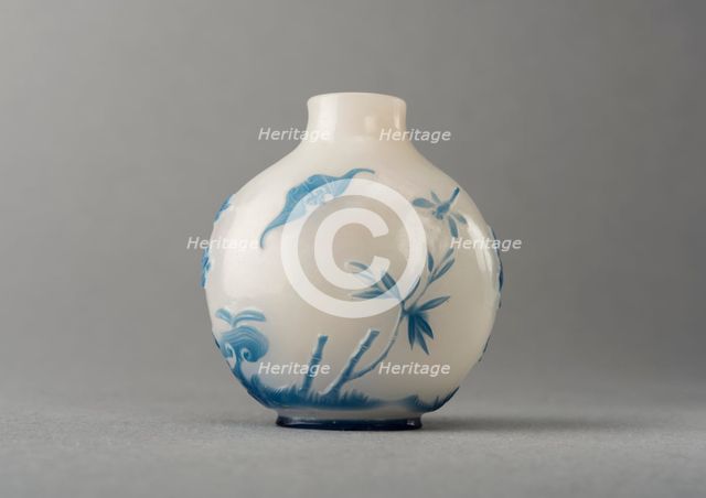 White glass snuff bottle with blue overlay, China, Qing dynasty, 1644-1911. Creator: Unknown.