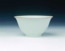 White glazed bowl with moulded design of dragons and carp, Qing dynasty, China, 1650-1670