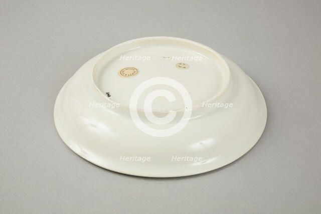 White dish with anhua design of two phoenix and cloud scroll design, Song dynasty, c.1300. Artist: Unknown.