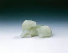 White jade recumbent horse with tail up, Qing dynasty, China, 18th century. Creator: Unknown