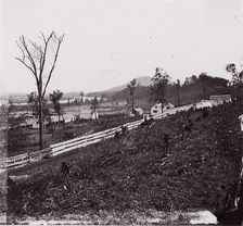 [White picket fence with buildings in background]. Brady album, p. 123, 1861-65. Creator: Unknown