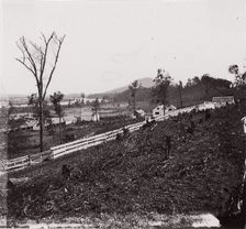 [White picket fence with buildings in background]. Brady album, p. 123, 1861-65. Creator: Unknown