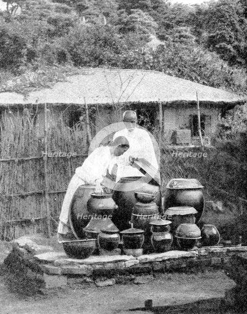 White-robed inhabitants of Korea, 1936.Artist: Wide World Photos