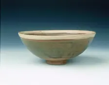 White rimmed celadon bowl with moulded peony scrolls, Jin dynasty, China, 13th century. Creator: Unknown