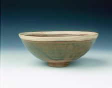 White rimmed celadon bowl with moulded peony scrolls, Jin dynasty, China, 13th century. Creator: Unknown