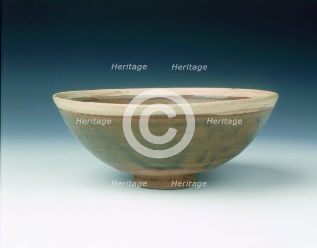White rimmed celadon bowl with moulded peony scrolls, Jin dynasty, China, 13th century. Creator: Unknown.