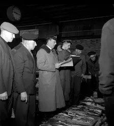 Wholesalers and fishmongers at the fish auction, Gothenburg, Sweden, 1960. Creator: Torkel Lindeberg