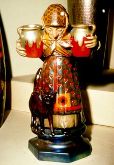 Witch and Cat: Pottery figure from Pecs, Hungary. 19th century