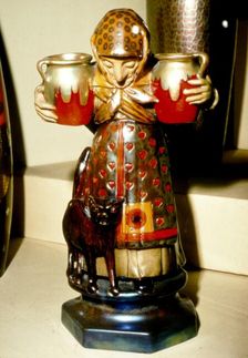 Witch and Cat: Pottery figure from Pecs, Hungary. 19th century