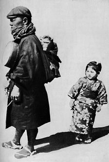 'With his drum and monkey he is Japan's equivalent to our old-style organ grinder c1900, (1921). Artist: Julian Leonard Street