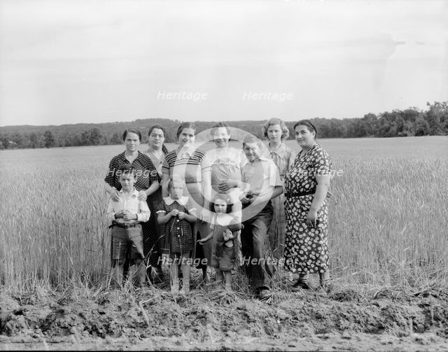 Wives and children of the farm group, Hightstown, New Jersey, 1936. Creator: Dorothea Lange.
