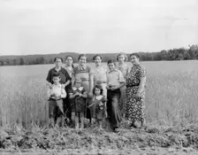 Wives and children of the farm group, Hightstown, New Jersey, 1936. Creator: Dorothea Lange