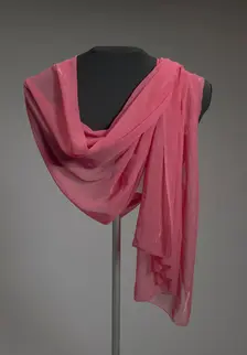Wide pink scarf with metallic border from Mae's Millinery Shop, 1941-1994. Creator: Unknown