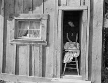 Wife and baby of president of Ola self-help sawmill co-op..., Gem County, Idaho, 1939. Creator: Dorothea Lange