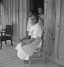 Wife of tenant farmer with two of her six children..., Chatham County, North Carolina, 1939. Creator: Dorothea Lange