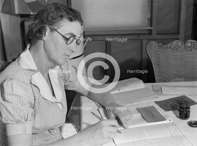 Wife of FSA borrower keeps account of loan of..., Dead Ox Flat, Malheur County, Oregon, 1939. Creator: Dorothea Lange.
