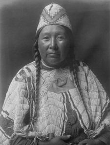 Wife of Mnainak-Yakima, c1910. Creator: Edward Sheriff Curtis