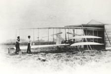 Wilbur and Orville Wright with Flyer II at Huffman Prairie, Dayton, Ohio, USA, May 1, 1904. Creator: NASA