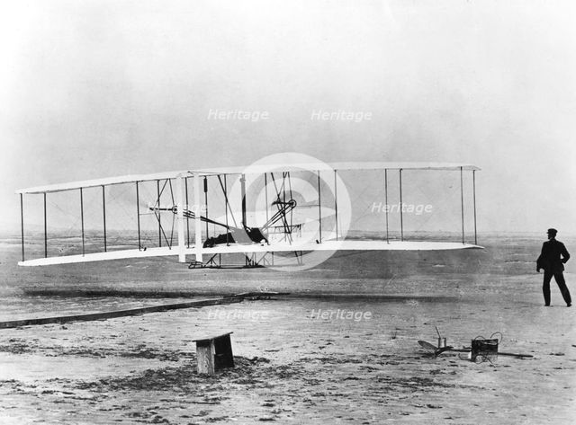 Wilbur and Orville Wright and the first powered flight, North Carolina, December 17 1903. Artist: Unknown