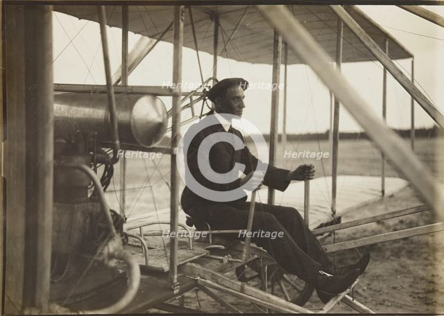 Wilbur Wright in the flyer, 1908. Creator: Anonymous.
