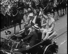 Wiley Post Sitting in a Car with Other Men, 1933. Creator: British Pathe Ltd