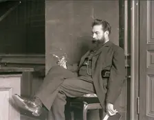 Wilhelm Conrad Röntgen in his laboratory, 1896. Creator: Anonymous
