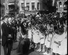 Wilhelmina, Her Majesty the Queen of the Netherlands Taking Flowers from Young Girls, 1930s. Creator: British Pathe Ltd