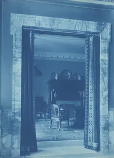 Willard Hotel - view through a curtained doorway to a lounge, between 1901and 1910. Creator: Frances Benjamin Johnston