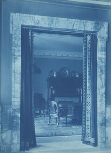 Willard Hotel - view through a curtained doorway to a lounge, between 1901and 1910. Creator: Frances Benjamin Johnston