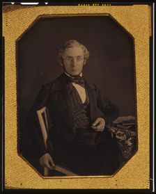 William Young McAllister, three-quarters length portrait, seated in a..., between 1848 and 1851. Creator: Marcus Aurelius Root