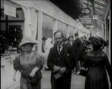 William Aitken, 1st Baron Beaverbrook, and His Wife, Gladys, Walking Together at the...London, 1922. Creator: British Pathe Ltd