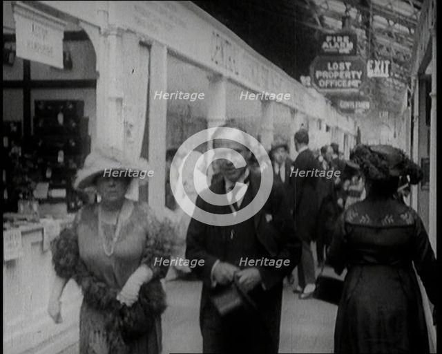 William Aitken, 1st Baron Beaverbrook, and His Wife, Gladys, Walking Together at the...London, 1922. Creator: British Pathe Ltd.