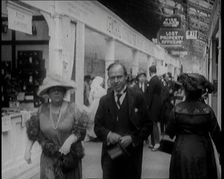 William Aitken, 1st Baron Beaverbrook, and His Wife, Gladys, Walking Together at the...London, 1922. Creator: British Pathe Ltd