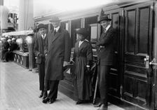 William Gibbs McAdoo, Secretary of The Treasury, Mrs. Albert Sidney Burleson; Target Practice, 1913. Creator: Harris & Ewing