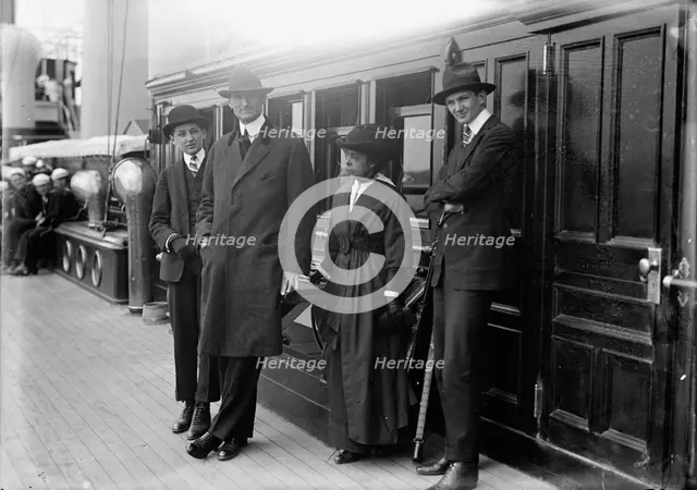 William Gibbs McAdoo, Secretary of The Treasury, Mrs. Albert Sidney Burleson; Target Practice, 1913. Creator: Harris & Ewing.