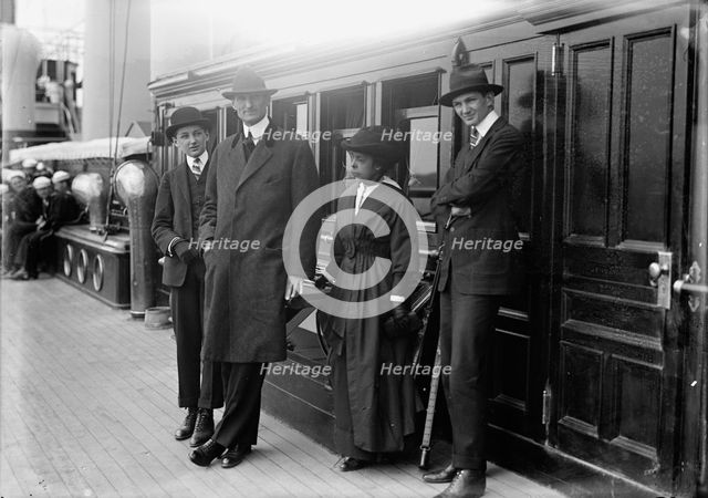 William Gibbs McAdoo, Secretary of The Treasury, Mrs. Albert Sidney Burleson; Target Practice, 1913. Creator: Harris & Ewing.