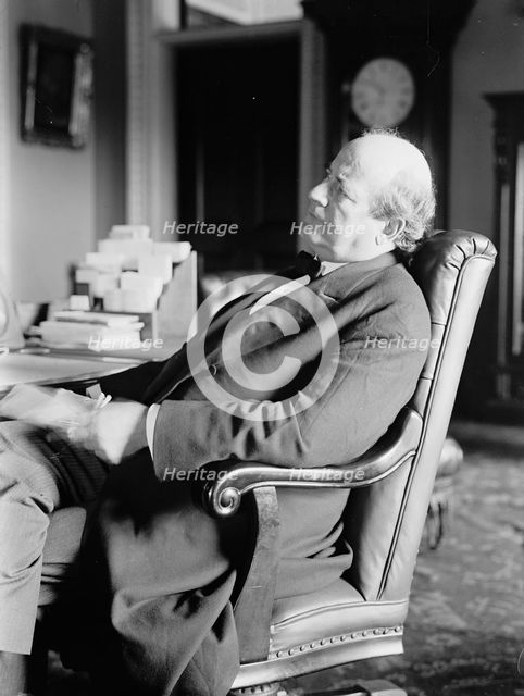 William Jennings Bryan, Rep. from Nebraska, at desk, 1914. Creator: Harris & Ewing.