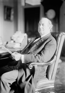 William Jennings Bryan, Rep. from Nebraska, at desk, 1914. Creator: Harris & Ewing
