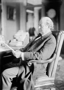 William Jennings Bryan, Rep. from Nebraska, at desk, 1914. Creator: Harris & Ewing
