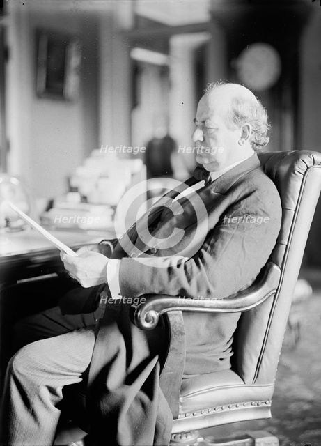 William Jennings Bryan, Rep. from Nebraska, at desk, 1914. Creator: Harris & Ewing.