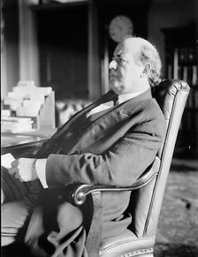 William Jennings Bryan, Rep. from Nebraska, at desk, 1914. Creator: Harris & Ewing