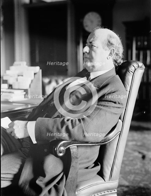 William Jennings Bryan, Rep. from Nebraska, at desk, 1914. Creator: Harris & Ewing.