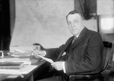 William Moulton Ingraham, Asst. Secretary of War, at Desk, 1916. Creator: Harris & Ewing
