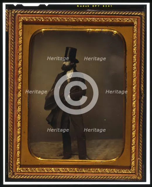 William Sidney Mount, full length portrait, facing left, wearing top hat..., between 1853 and 1860. Creator: Mathew Brady.