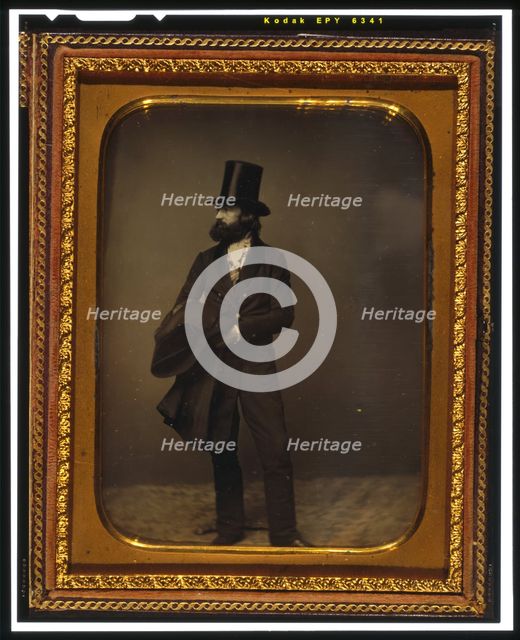 William Sidney Mount, full length portrait, facing left, wearing top hat..., between 1853 and 1860. Creator: Mathew Brady.