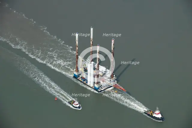 Wind farm construction vessel en route to a construction site, Harwich Harbour, Suffolk, c2010s(?). Artist: Damian Grady.